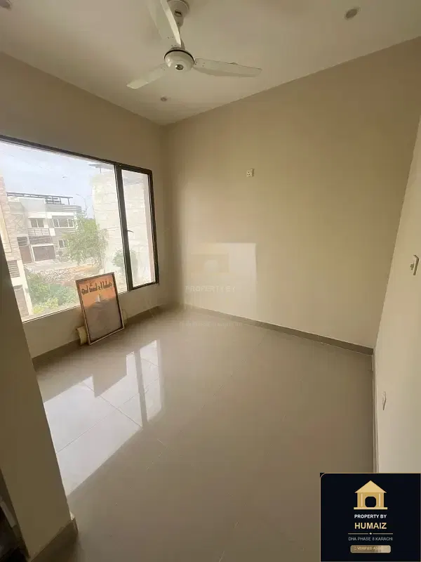 120 Sq. Yd. 4-Bedroom Luxury Villa in Zone B For Rent in DHA Phase 8 Karachi — Photograph 2