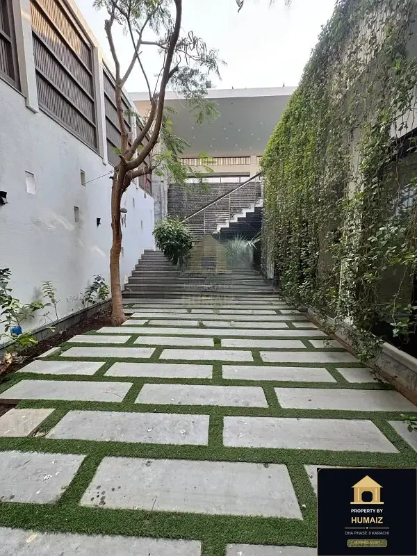 2,000 Sq. Yd. 5-Bedroom Luxury Villa on Qasim Street For Sale in DHA Phase 8 Karachi — Photograph 11