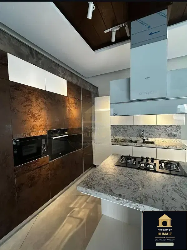 1,000 Sq. Yd. 6-Bedroom Luxury Villa on Qasim Street For Sale in DHA Phase 8 Karachi — Photograph 4
