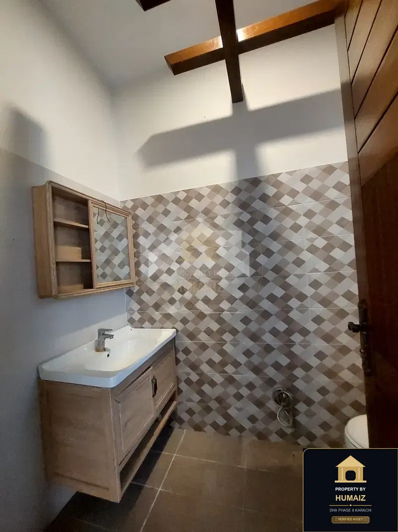100 Sq. Yd. 4-Bedroom Luxury Villa (Basement, 5 Bath, Residence 6) in DHA Phase 8 For Sale in DHA Phase 8 Karachi — Photograph 3