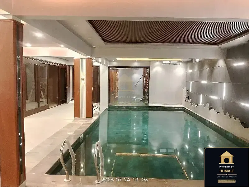 1,000 Sq. Yd. 6-Bedroom Luxury Villa (Basement, 6 Bath, Residence 3) in Khayaban-e-Tariq For Sale in DHA Phase 8 Karachi — Photograph 4