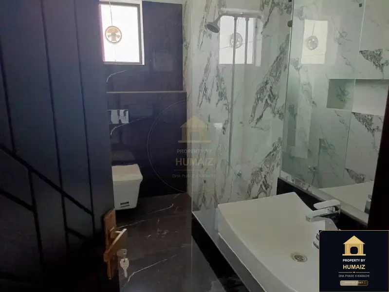 500 Sq. Yd. 6-Bedroom Luxury Villa (Basement, 6 Bath, Residence 3) in DHA Phase 8 For Rent in DHA Phase 8 Karachi — Photograph 9