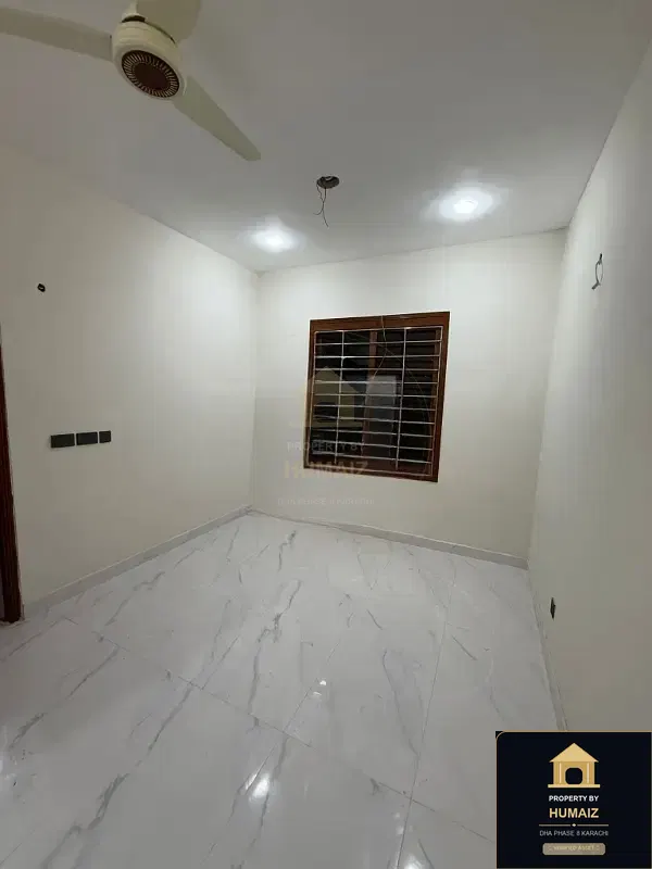 100 Sq. Yd. 4-Bedroom Luxury Villa (Basement, 5 Bath, Residence 12) in DHA Phase 8 For Sale in DHA Phase 8 Karachi — Photograph 4
