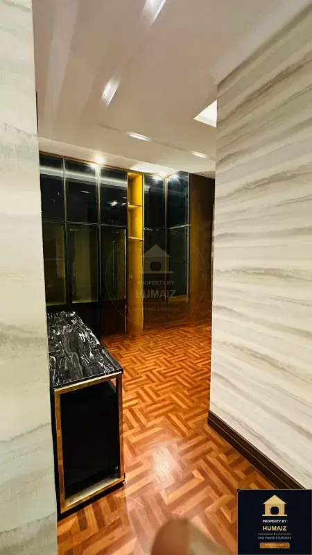 1,000 Sq. Yd. 6-Bedroom Luxury Villa (Basement, 7 Bath, Residence 5) in Zone A For Sale in DHA Phase 8 Karachi — Photograph 19