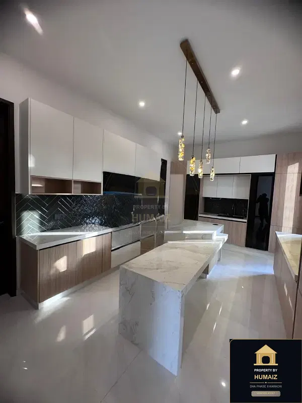 600 Sq. Yd. 6-Bedroom Luxury Villa (Basement, 7 Bath, Residence 3) in DHA Phase 8 For Sale in DHA Phase 8 Karachi — Photograph 2