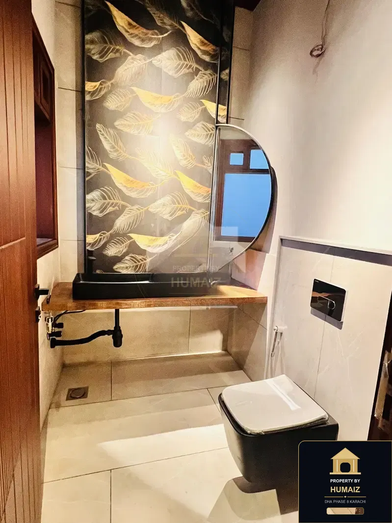 1,000 Sq. Yd. 6-Bedroom Luxury Villa (Private Pool, 6 Bath, Residence 13) in DHA Phase 8 For Sale in DHA Phase 8 Karachi — Photograph 4