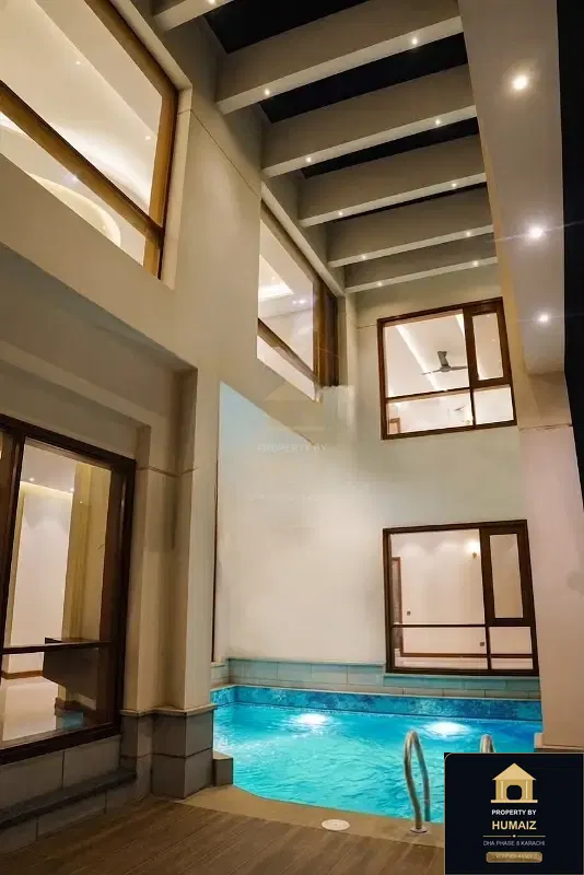 1,000 Sq. Yd. 6-Bedroom Luxury Villa on Khayaban-e-Ittehad For Sale in DHA Phase 8 Karachi — Photograph 3