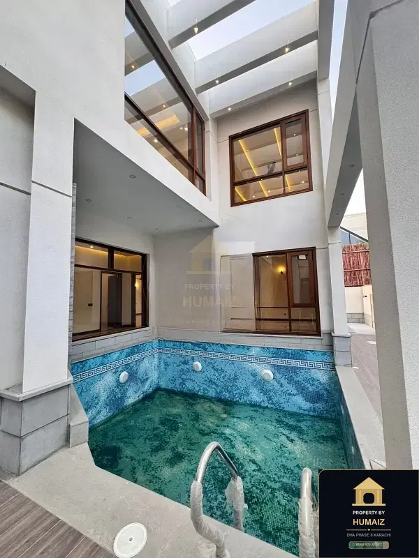 1,000 Sq. Yd. 6-Bedroom Luxury Villa (Private Pool, 6 Bath, Residence 12) in Zone A For Sale in DHA Phase 8 Karachi — Photograph 20