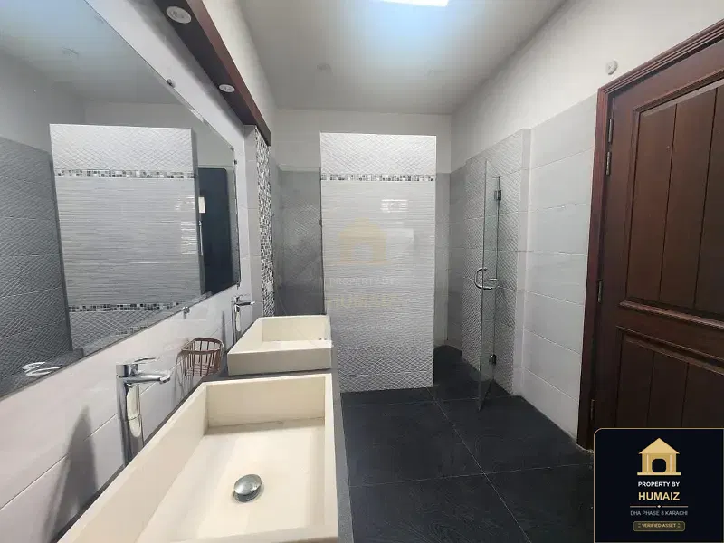 500 Sq. Yd. 6-Bedroom Luxury Villa (Basement, 7 Bath, Residence 5) in DHA Phase 8 For Rent in DHA Phase 8 Karachi — Photograph 9