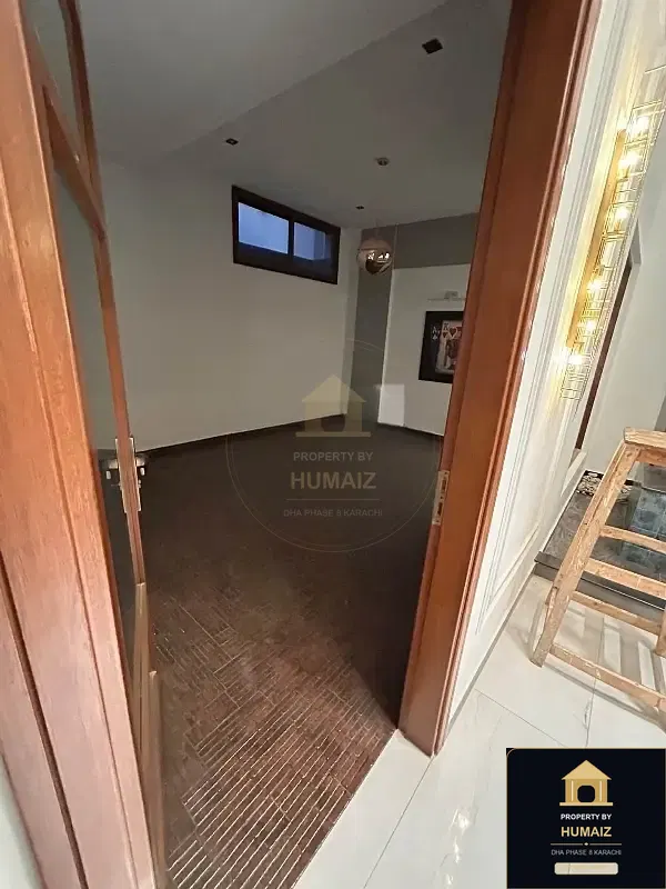 500 Sq. Yd. 6-Bedroom Luxury Villa in Zone C For Sale in DHA Phase 8 Karachi — Photograph 11