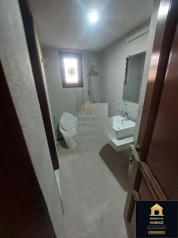 500 Sq. Yd. 6-Bedroom Luxury Villa (Basement, 6 Bath, Residence 25) in DHA Phase 8 For Rent in DHA Phase 8 Karachi — Photograph 17