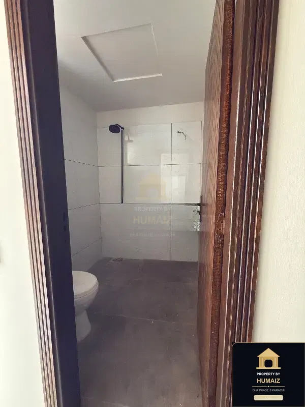 125 Sq. Yd. Architectural Villa on Al-Murtaza Commercial For Rent in DHA Phase 8 Karachi — Photograph 8