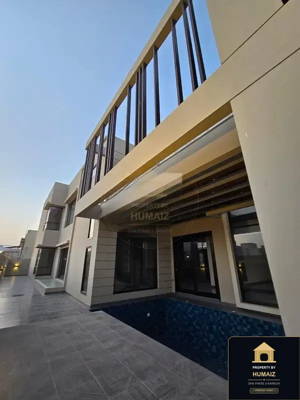 1,000 Sq. Yd. 7-Bedroom Luxury Villa (Basement, 7 Bath, Residence 1) in Khayaban-e-Ittehad For Sale in DHA Phase 8 Karachi — Photograph 2