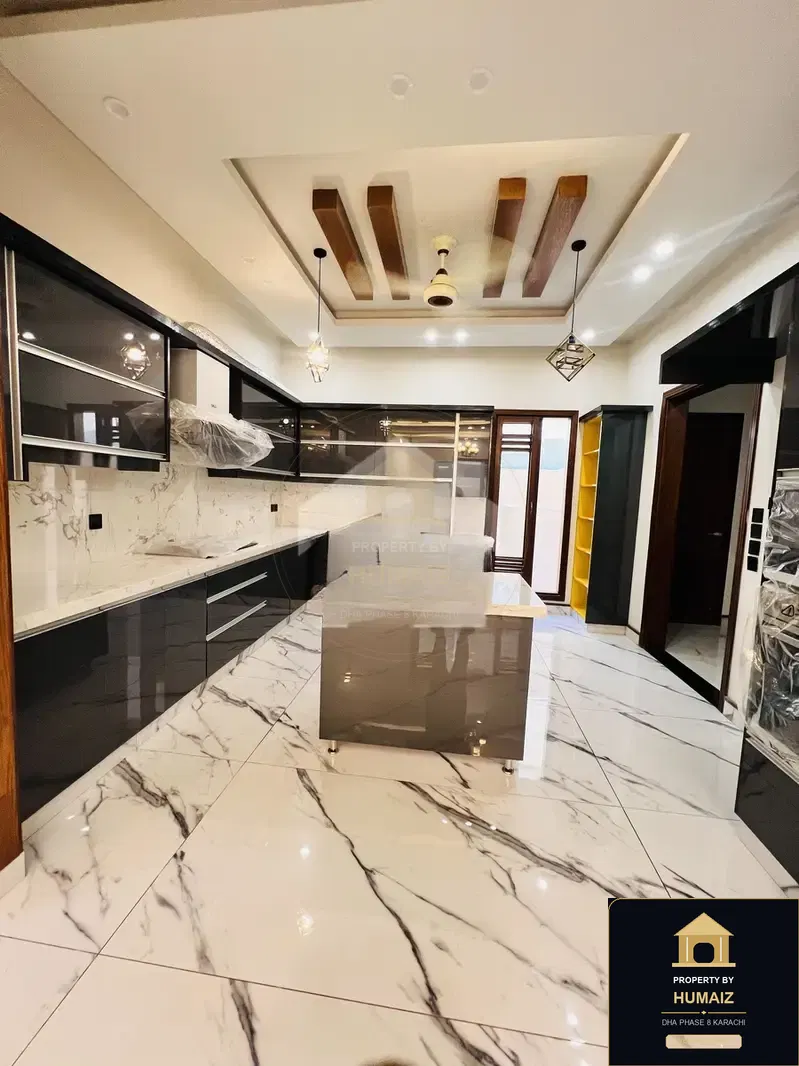 500 Sq. Yd. 6-Bedroom Luxury Villa (Private Pool, 6 Bath, Residence 2) in DHA Phase 8 For Sale in DHA Phase 8 Karachi — Photograph 3