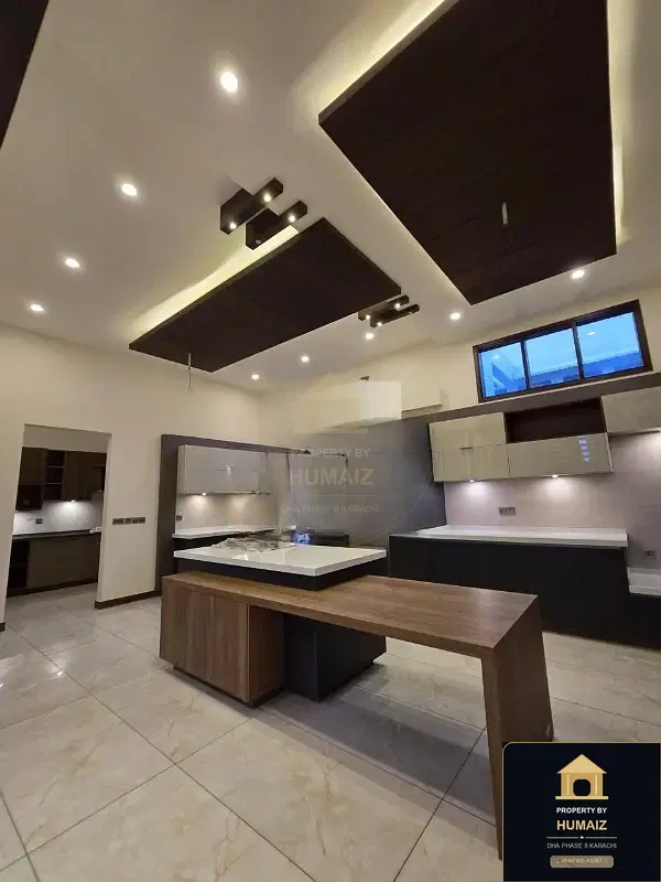 1,000 Sq. Yd. 7-Bedroom Luxury Villa (Basement, 7 Bath, Residence 1) in Khayaban-e-Ittehad For Sale in DHA Phase 8 Karachi — Photograph 5