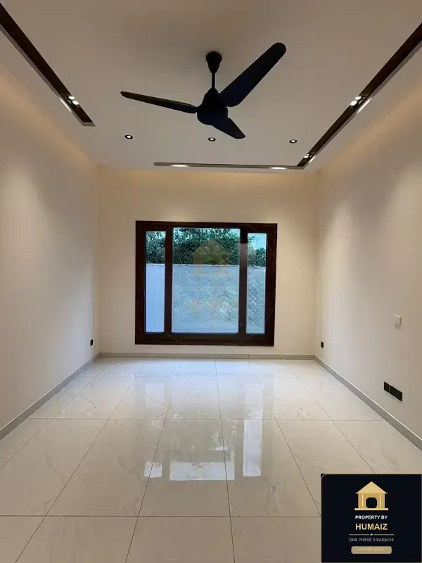 1,000 Sq. Yd. 10-Bedroom Luxury Villa (Basement, 6 Bath, Residence 2) in Zone A For Sale in DHA Phase 8 Karachi — Photograph 8