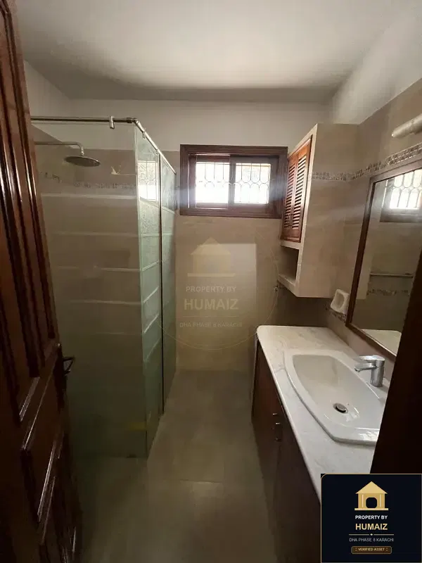 500 Sq. Yd. 6-Bedroom Luxury Villa (Basement, 6 Bath, Residence 1) in Zone A For Rent in DHA Phase 8 Karachi — Photograph 8