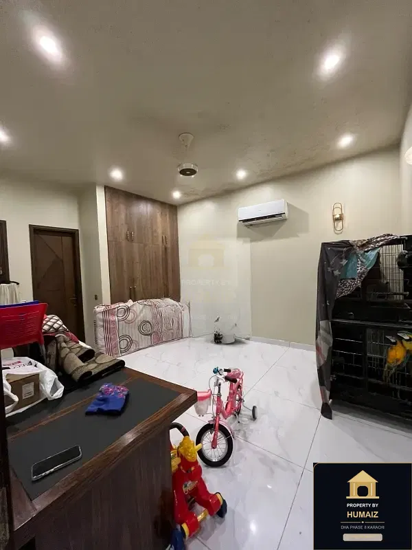 150 Sq. Yd. 4-Bedroom Luxury Villa (Basement, 4 Bath, Residence 1) in DHA Phase 8 For Rent in DHA Phase 8 Karachi — Photograph 3