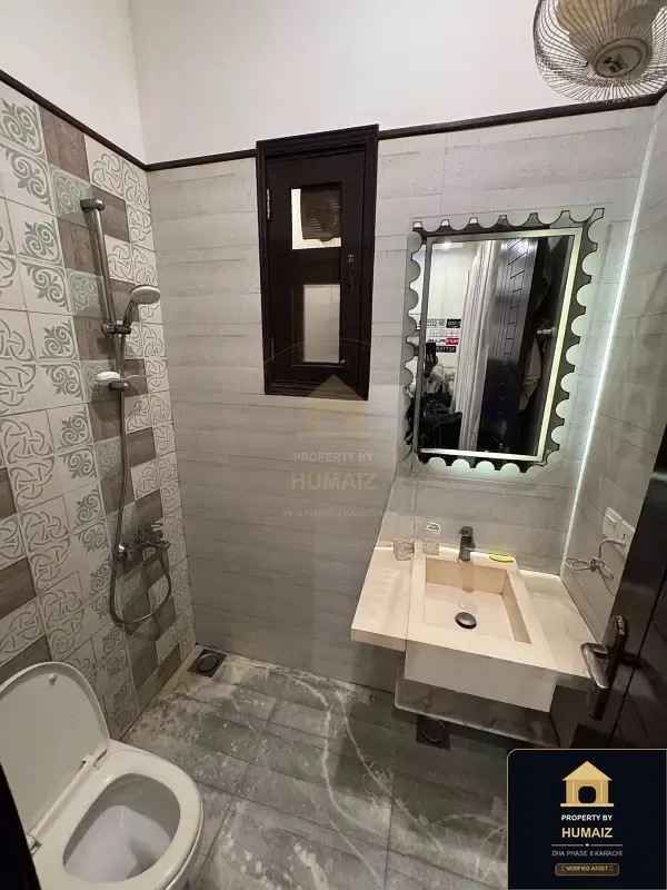 100 Sq. Yd. 4-Bedroom Luxury Villa (Basement, 5 Bath, Residence 16) in DHA Phase 8 For Sale in DHA Phase 8 Karachi — Photograph 12