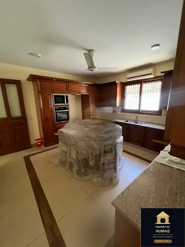 500 Sq. Yd. 6-Bedroom Luxury Villa (Basement, 6 Bath, Residence 1) in Zone A For Rent in DHA Phase 8 Karachi — Photograph 7