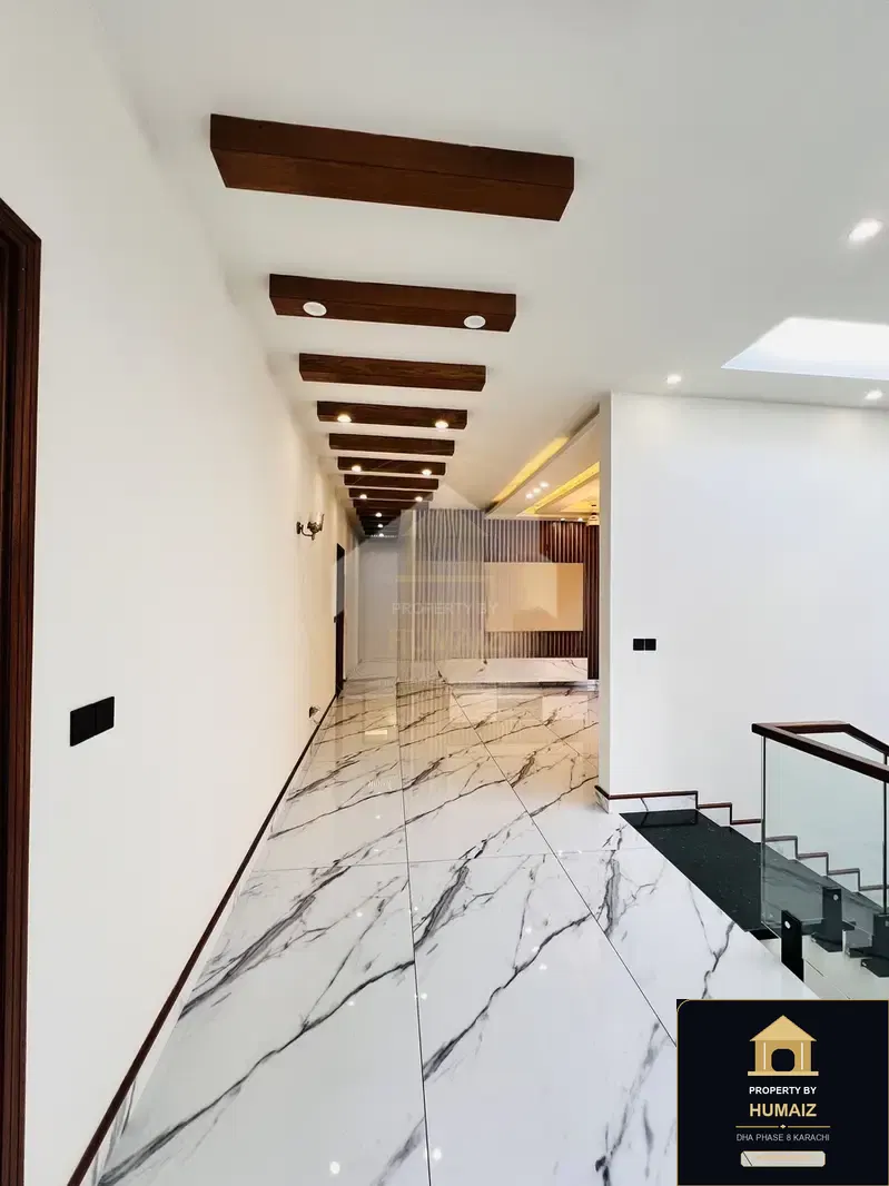 500 Sq. Yd. 6-Bedroom Luxury Villa (Private Pool, 6 Bath, Residence 2) in DHA Phase 8 For Sale in DHA Phase 8 Karachi — Photograph 11