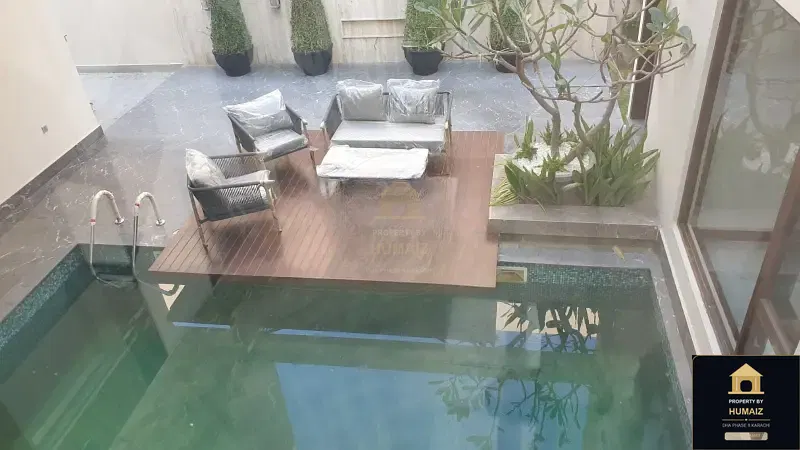 1,000 Sq. Yd. 6-Bedroom Luxury Villa (Basement, 6 Bath, Residence 2) in Zone A For Sale in DHA Phase 8 Karachi — Photograph 10