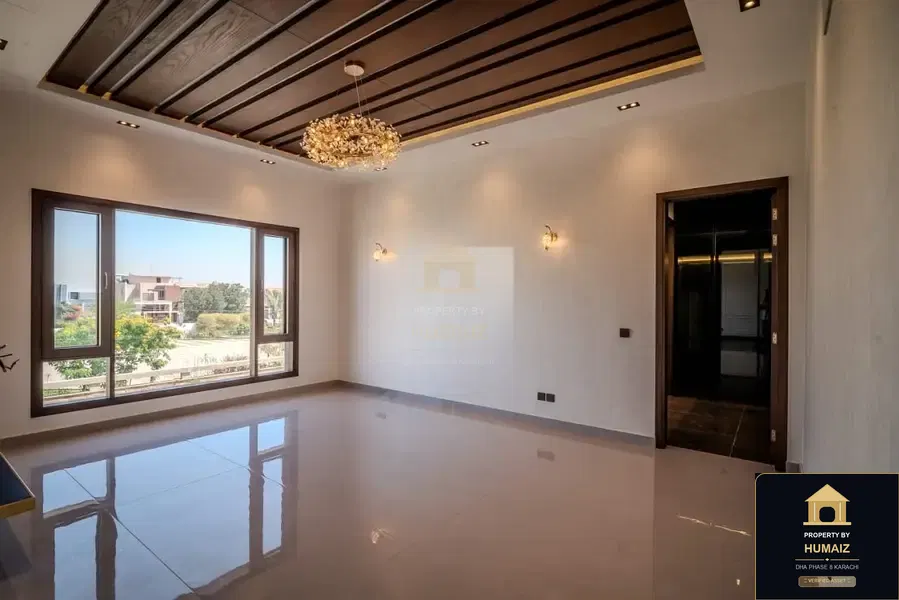 1,000 Sq. Yd. 7-Bedroom Luxury Villa (Basement, 7 Bath, Residence 1) in Zone A For Sale in DHA Phase 8 Karachi — Photograph 9