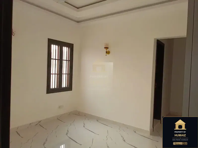 500 Sq. Yd. 6-Bedroom Luxury Villa (Basement, 6 Bath, Residence 3) in DHA Phase 8 For Rent in DHA Phase 8 Karachi — Photograph 8