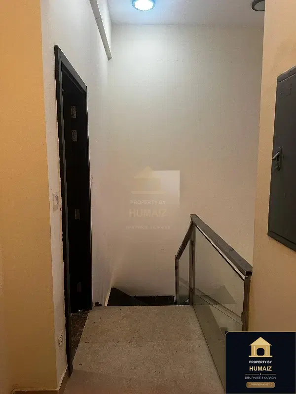 2,500 Sq. Yd. 3-Bedroom Luxury Villa at Coral Towers For Sale in DHA Phase 8 Karachi — Photograph 4