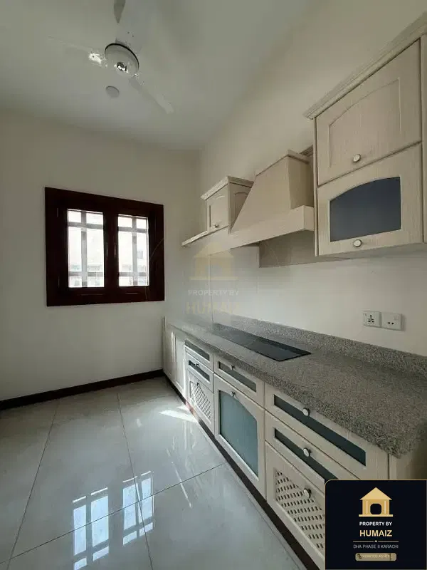 1,000 Sq. Yd. 6-Bedroom Luxury Villa (6 Bath, Residence 10) in DHA Phase 8 For Rent in DHA Phase 8 Karachi — Photograph 16