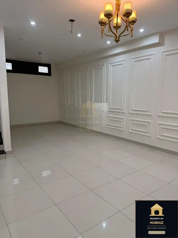 100 Sq. Yd. 4-Bedroom Luxury Villa (Basement, 4 Bath, Residence 2) in DHA Phase 8 For Rent in DHA Phase 8 Karachi — Photograph 4
