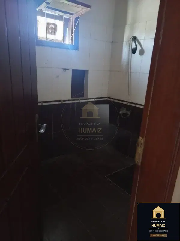 1,000 Sq. Yd. 5-Bedroom Luxury Villa in Khayaban-e-Iqbal For Sale in DHA Phase 8 Karachi — Photograph 7