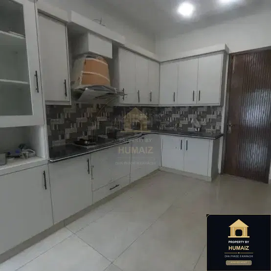 100 Sq. Yd. 4-Bedroom Luxury Villa (5 Bath, Residence 10) in DHA Phase 8 For Sale in DHA Phase 8 Karachi — Photograph 3