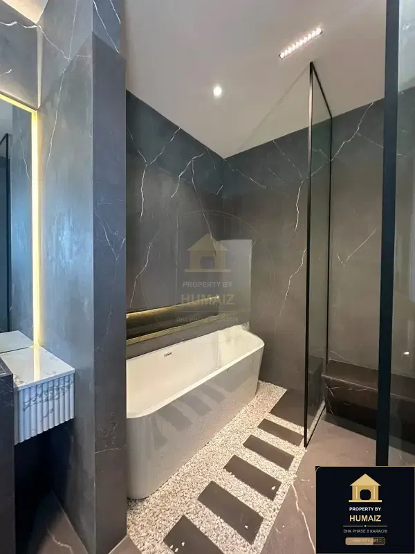666 Sq. Yd. 5-Bedroom Luxury Villa on Khayaban-e-Ittehad For Sale in DHA Phase 8 Karachi — Photograph 12
