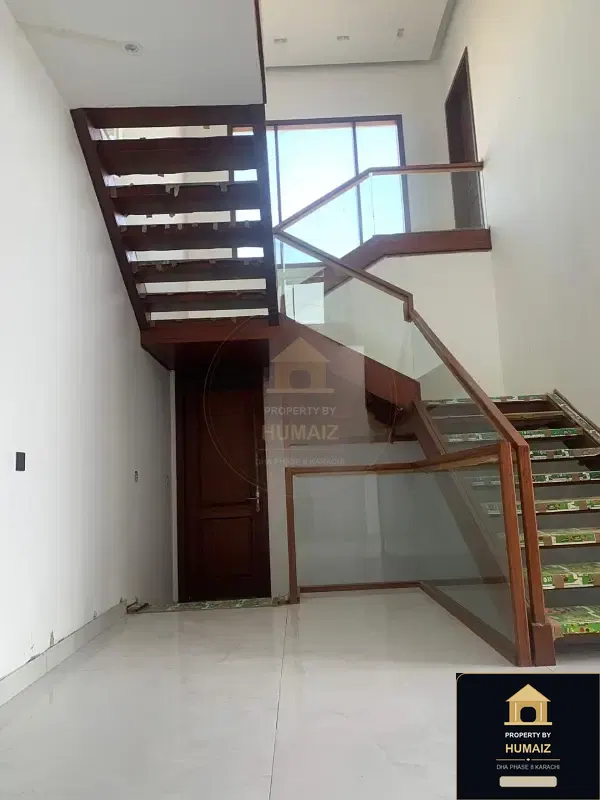 500 Sq. Yd. 6-Bedroom Luxury Villa (6 Bath, Residence 32) in DHA Phase 8 For Sale in DHA Phase 8 Karachi — Property by Humaiz Architectural Asset
