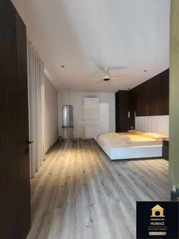 1,000 Sq. Yd. 6-Bedroom Luxury Villa (Basement, 6 Bath, Residence 1) in Khayaban-e-Iqbal For Sale in DHA Phase 8 Karachi — Photograph 6