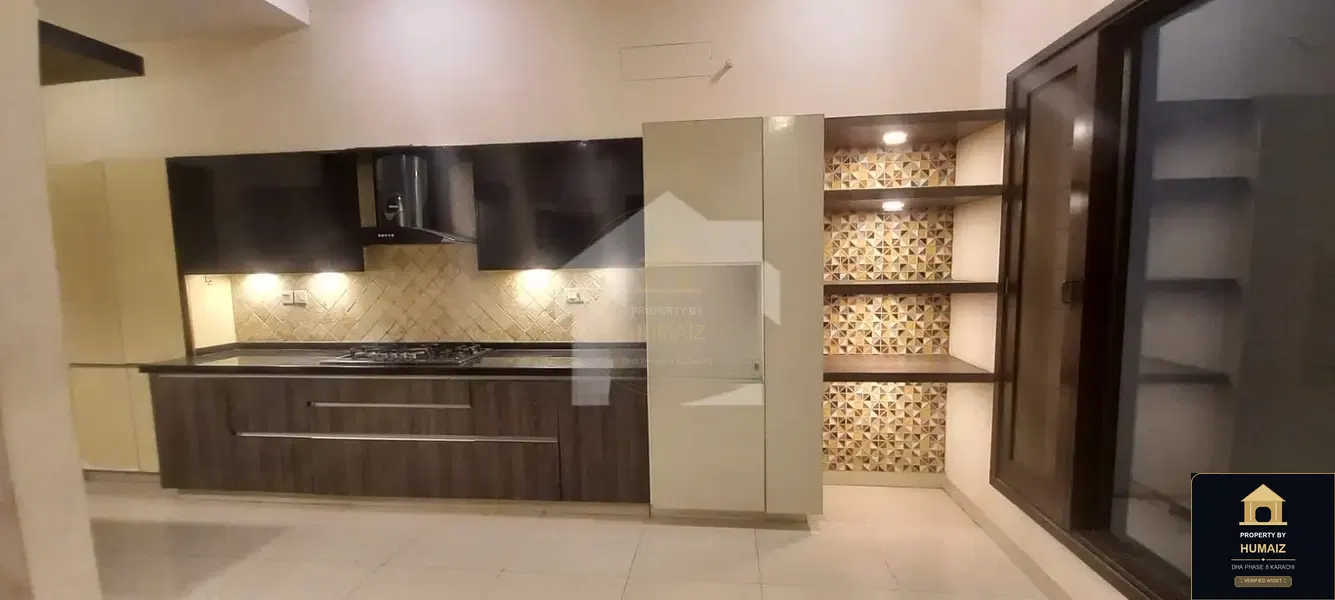 100 Sq. Yd. 4-Bedroom Luxury Villa (Basement, 5 Bath, Residence 1) in Khayaban-e-Iqbal For Rent in DHA Phase 8 Karachi — Photograph 9