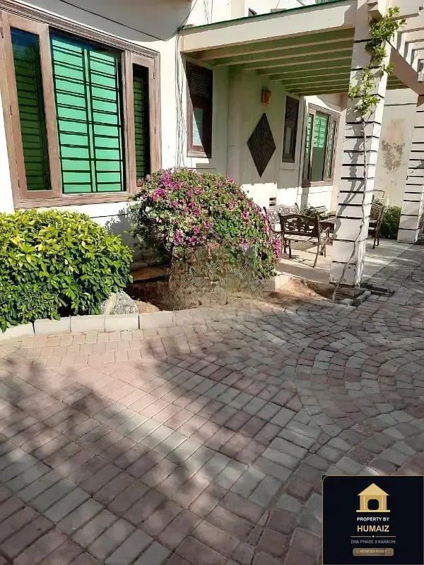 1,000 Sq. Yd. 6-Bedroom Luxury Villa (6 Bath, Residence 30) in DHA Phase 8 For Sale in DHA Phase 8 Karachi — Photograph 16