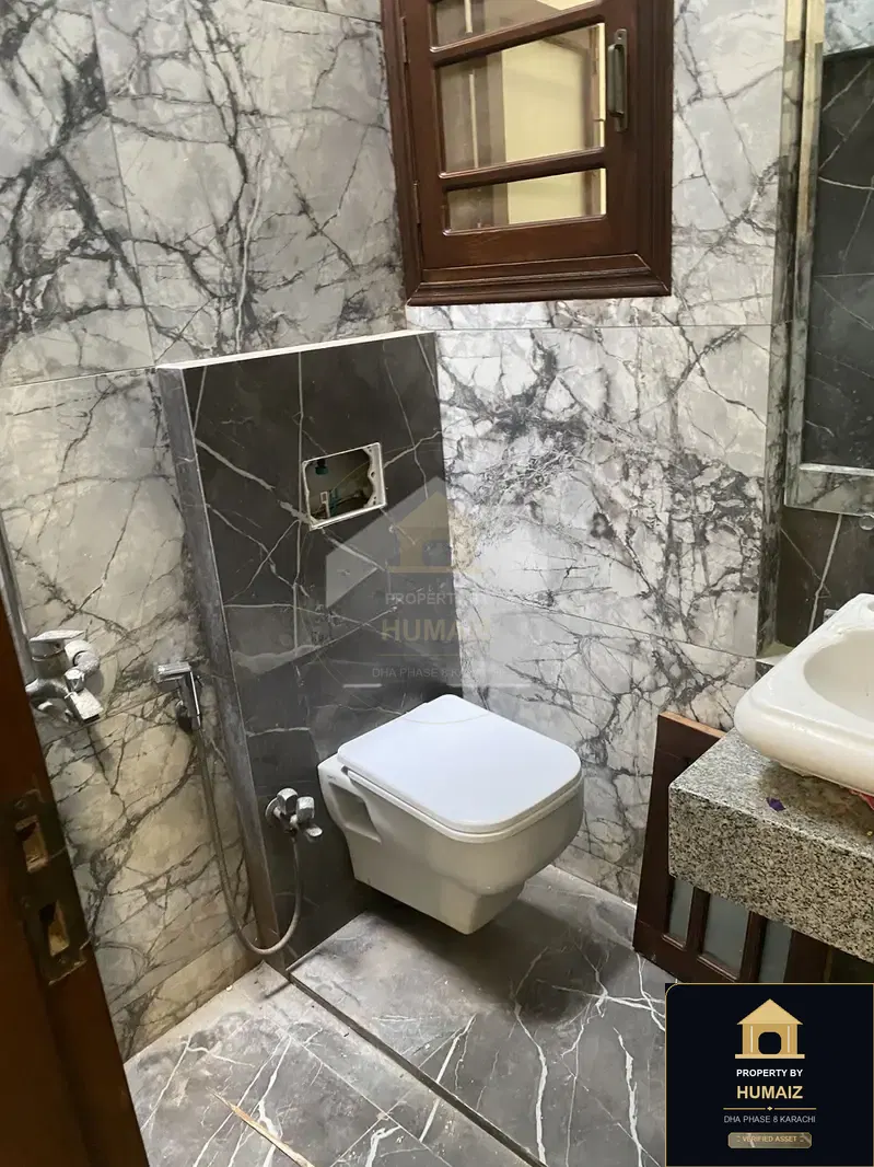 100 Sq. Yd. 4-Bedroom Luxury Villa (Basement, 5 Bath, Residence 1) in DHA Phase 8 For Rent in DHA Phase 8 Karachi — Photograph 5