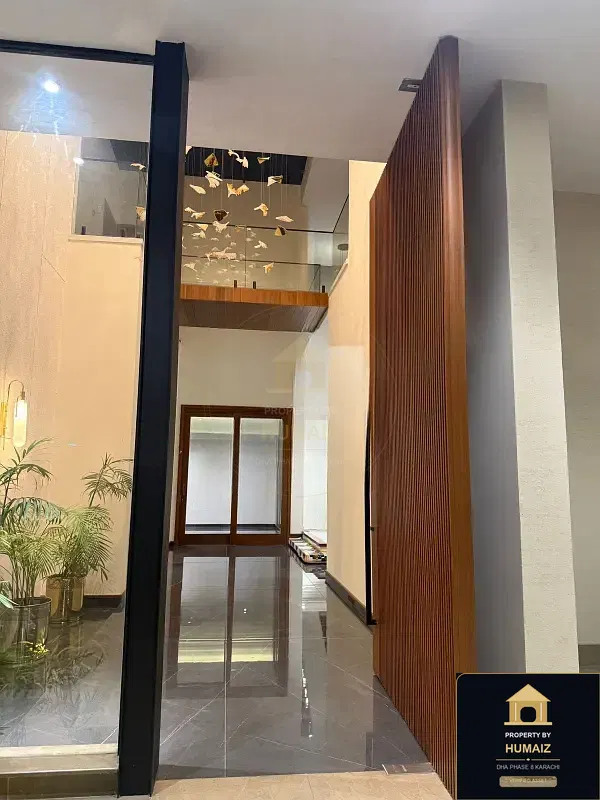 1,000 Sq. Yd. 7-Bedroom Luxury Villa in Khayaban-e-Ghalib For Sale in DHA Phase 8 Karachi — Property by Humaiz Architectural Asset