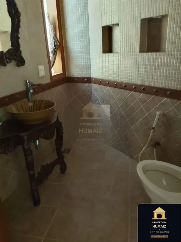 1,000 Sq. Yd. 6-Bedroom Luxury Villa (Private Pool, 6 Bath, Residence 1) in Khayaban-e-Tariq For Sale in DHA Phase 8 Karachi — Photograph 22