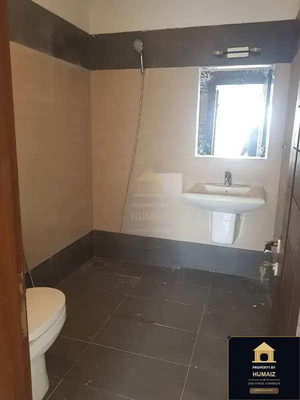4-Bedroom Luxury Apartment (Basement, 5 Bath, Suite 1) on Al-Murtaza Commercial For Sale in DHA Phase 8 Karachi — Photograph 8