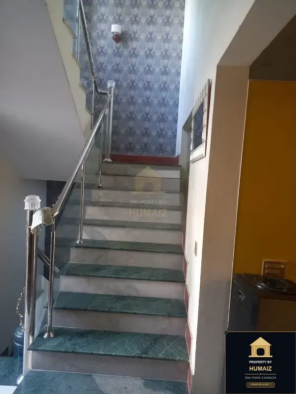 100 Sq. Yd. 3-Bedroom Luxury Villa (Basement, 4 Bath, Residence 1) in Khayaban-e-Iqbal For Sale in DHA Phase 8 Karachi — Photograph 6
