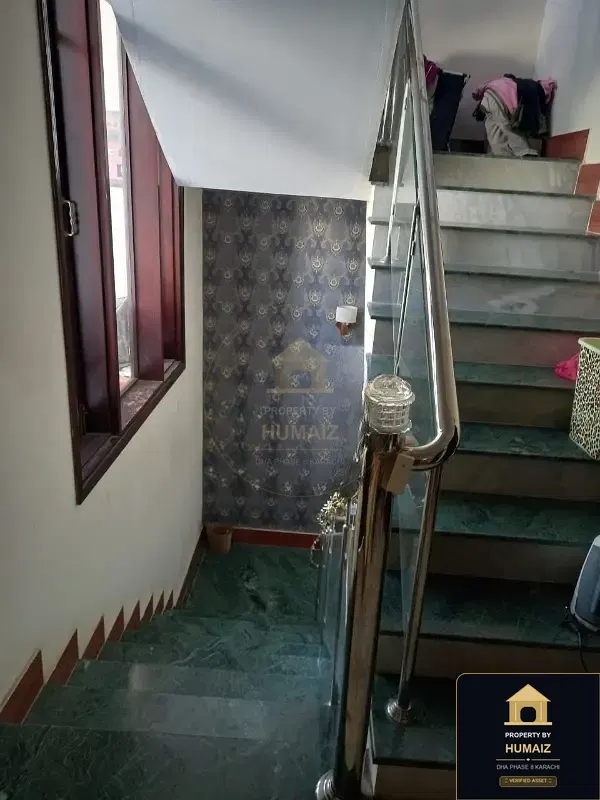 100 Sq. Yd. 3-Bedroom Luxury Villa (Basement, 4 Bath, Residence 1) in Khayaban-e-Iqbal For Sale in DHA Phase 8 Karachi — Photograph 3
