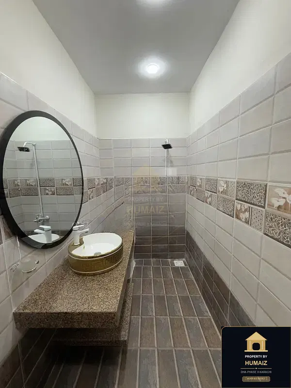 100 Sq. Yd. 4-Bedroom Luxury Villa (Basement, 5 Bath, Residence 12) in DHA Phase 8 For Sale in DHA Phase 8 Karachi — Photograph 5