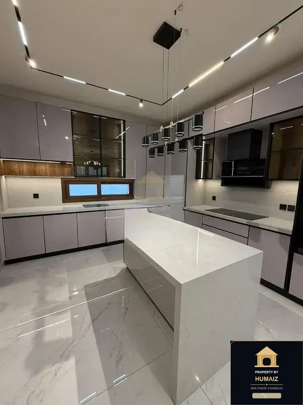 1,000 Sq. Yd. 10-Bedroom Luxury Villa (Basement, 6 Bath, Residence 3) in Zone A For Sale in DHA Phase 8 Karachi — Photograph 3
