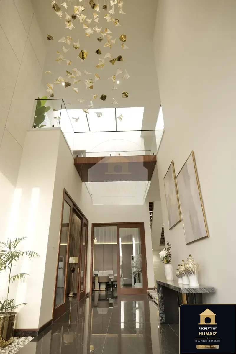 1,000 Sq. Yd. 7-Bedroom Luxury Villa in Khayaban-e-Bahria For Sale in DHA Phase 8 Karachi — Photograph 9