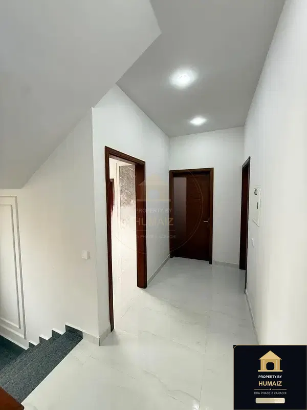100 Sq. Yd. 4-Bedroom Luxury Villa (Basement, 4 Bath, Residence 3) in Zone B For Sale in DHA Phase 8 Karachi — Photograph 9