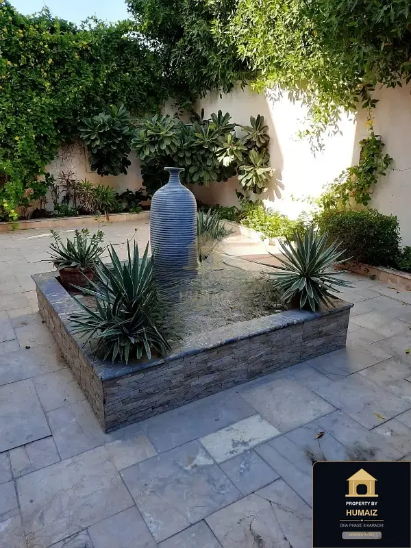 1,000 Sq. Yd. 6-Bedroom Luxury Villa (6 Bath, Residence 30) in DHA Phase 8 For Sale in DHA Phase 8 Karachi — Photograph 9