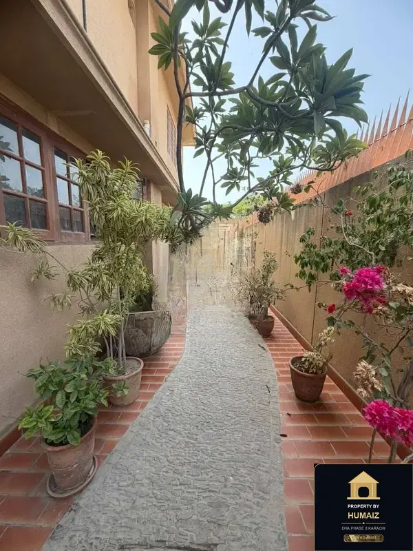 1,000 Sq. Yd. 6-Bedroom Luxury Villa (7 Bath, Residence 59) in DHA Phase 8 For Sale in DHA Phase 8 Karachi — Photograph 3